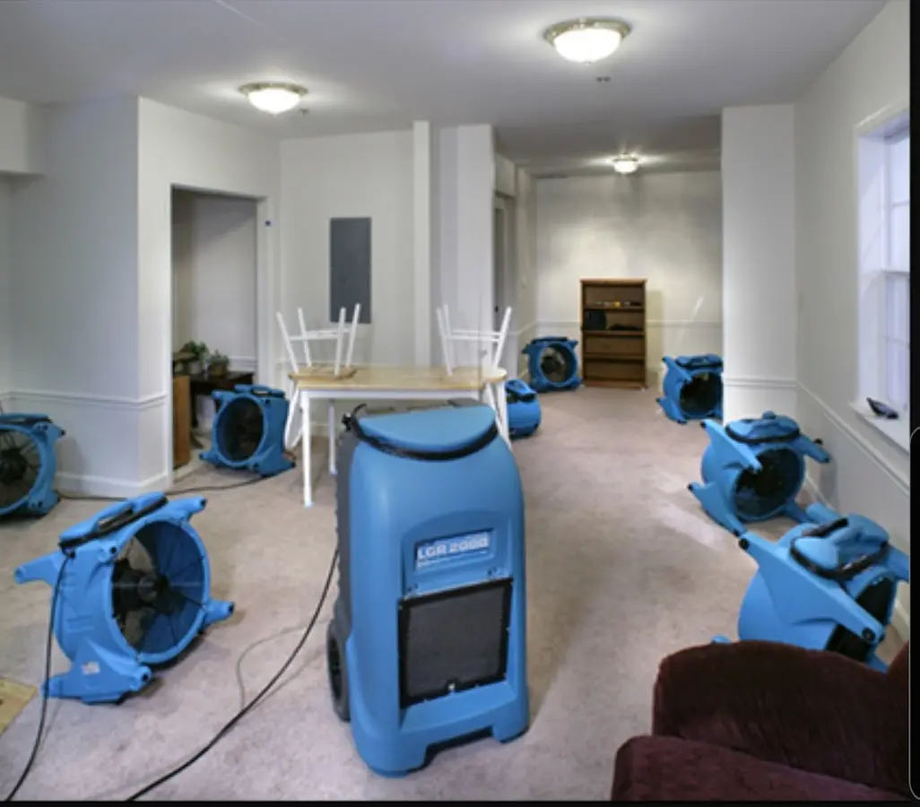 Air movers and dehumidifier setup for Water Damage Restoration in Meriden